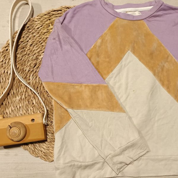 Buzo rapsodia T10 (detalle)